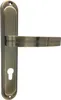 A close-up studio shot of a bronze-colored door handle with a keyhole plate. Produktbild-Vorschau