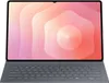 A tablet with a keyboard attached, displaying a colorful abstract wallpaper on its screen. Produktbild-Vorschau