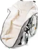 A close-up, angled view of a wheelchair accessory, likely a footmuff or cover, lined with white faux fur and an outer gray fabric, attached to a wheelchair. Produktbild-Vorschau