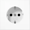 A close-up studio shot of a white electrical outlet on a white background. Náhled obrázku produktu