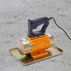 A concrete vibrator is placed on a concrete surface. Podgląd zdjęcia produktu