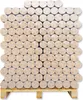 A pallet stacked with many round wood briquettes. Produktbild-Vorschau