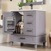 A gray bathroom vanity with its door open, showing storage shelves and bottles inside. The vanity has a white countertop and black handles on its drawers. Anteprima dell’immagine prodotto