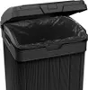 A close-up view of the top of a black trash can with a black trash bag inside and the lid open. Anteprima dell’immagine prodotto