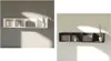 Two images of a wall shelf with compartments, one white and one black, each displaying CDs and a plant. Náhľad obrázku produktu