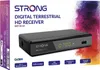 The image shows the packaging of a digital terrestrial HD receiver, with the product itself prominently displayed. Podgląd zdjęcia produktu