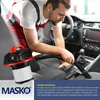 A man is vacuuming the interior of a car with a wet/dry vacuum cleaner. Produktbild-Vorschau