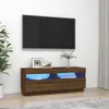 A modern living room setup featuring a TV stand with LED lighting and a large television mounted on the wall. Náhled obrázku produktu