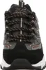 A front view of a black Skechers D'Lites sneaker with rose gold accents. Voir les images du produit