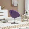 A purple armchair is placed in a room with a dresser, a coffee table, and a rug. Produktbild-Vorschau