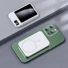 A white power bank and a green smartphone are shown on a gray surface. Produktbild-Vorschau