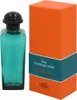 A bottle of Hermès Eau d'Orange Verte cologne and its packaging. Náhled obrázku produktu