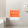 A wall-mounted folding shower seat in a bathroom setting. Náhled obrázku produktu