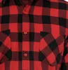 A close-up view of a red and black checkered flannel shirt. Produktbild-Vorschau