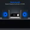 A Medion micro audio system with two speakers, presented on a dark shelf with blue light effects emanating from the speakers. Produktbild-Vorschau