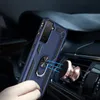 A blue phone case with a ring holder is shown attached to a magnetic car mount on a car's air vent. Produktbild-Vorschau