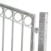 A close-up view of a metal gate hinge and part of the gate structure. Produktbild-Vorschau
