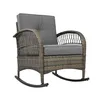 A single wicker rocking chair with gray cushions, shown from a front-diagonal angle against a white background. Podgląd zdjęcia produktu