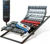 A motorized adjustable bed frame with a remote control. Produktbild-Vorschau