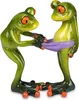Two green frogs with orange eyes are depicted. One frog is holding a purple piece of fabric, possibly underwear, while the other frog stands with it around its waist. Produktbild-Vorschau