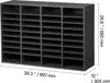 A dark gray literature organizer with 36 compartments. Voir les images du produit