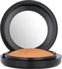 A close-up studio shot of an open compact powder makeup product. Podgląd zdjęcia produktu