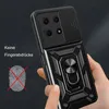 A hand holding a black phone case with a ring holder and camera cover. Produktbild-Vorschau