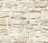 A close-up view of a stone wall texture. Produktbild-Vorschau