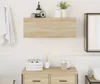 A bathroom shelf and cabinet are shown in a well-lit room with tiled walls. Anteprima dell’immagine prodotto