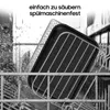A black air fryer basket with a metal rack is being cleaned in a dishwasher. Produktbild-Vorschau