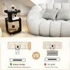 A side table next to a sofa, with a comparison graphic below. Produktbild-Vorschau
