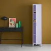 A tall, slender purple cabinet stands open next to a black console table with a lamp, artwork, and vases. Produktbild-Vorschau