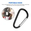 A person is shown in a circular inset, with a carabiner hook in the foreground. Produktbild-Vorschau
