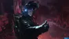 A soldier in a helmet holding a small object in a dark, red-lit environment. Produktbild-Vorschau