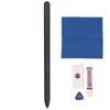A stylus pen and accessories are laid out on a white background. Náhled obrázku produktu