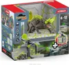 The image shows the packaging of a toy set, featuring a creature and its environment. Produktbild-Vorschau