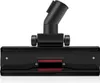 A close-up studio shot of a black vacuum cleaner floor nozzle against a white background. Anteprima dell’immagine prodotto