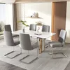 A dining room set with a marble-top table and six gray upholstered chairs. Náhľad obrázku produktu