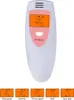 A portable oral hygiene detector with a display screen and a power button, shown with various rating indicators below. Produktbild-Vorschau