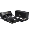 A pair of aviator sunglasses with their case and box, presented on a white background. Náhled obrázku produktu