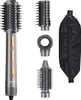 A multi-hair styler with its attachments and storage bag, displayed against a white background. Produktbild-Vorschau