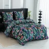 A bed with floral patterned bedding. Produktbild-Vorschau