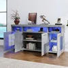 A modern gray sideboard with LED lighting and glass doors, showcasing decorative items and books. Produktbild-Vorschau