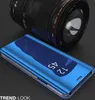 A blue flip case for a smartphone is displayed in front of a camera lens. Produktbild-Vorschau