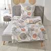 A bed with bedding and a pillow, set in a bedroom. Produktbild-Vorschau