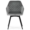 A gray velvet dining chair with a quilted back and black metal legs, shown from the front on a white background. Náhled obrázku produktu