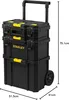 A black Stanley modular rolling toolbox with yellow accents is shown against a white background. Dimensions are indicated by lines and numbers. Voir les images du produit