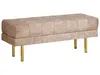 A taupe upholstered bench with tufted detailing and gold legs, photographed against a white background. Náhled obrázku produktu