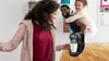 A family is gathered around a coffee maker. Produktbild-Vorschau
