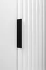 A black handle is attached to a white ribbed surface. Podgląd zdjęcia produktu